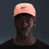 Nike Unisex Dri-fit Club Unstructured Featherlight Cap In Orange