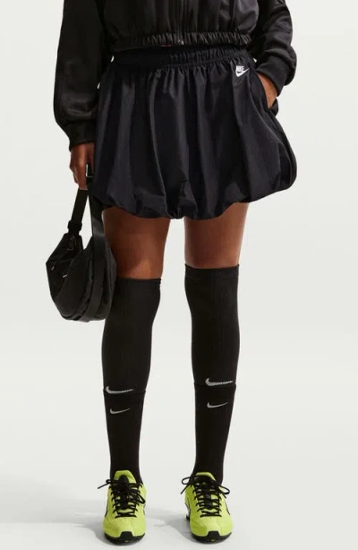 Nike Water Repellent Bubble Miniskirt In Black