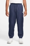 Nike Windrunner Water Repellent Track Pants In Blue