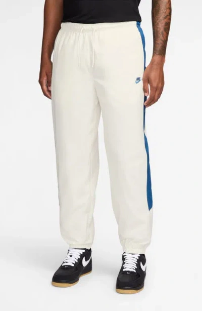 Nike Windrunner Water Repellent Track Pants In Multi