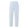 Nike (wmns)  Living Series Solid Color Logo Printing Elastic Waistband Bundle Feet Sports Pants/trous In Blue
