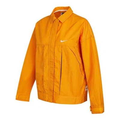 Nike (wmns)  Sportswear Swoosh Back Logo Printing Woven Jacket Yellow In Orange