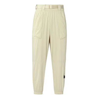 Nike (wmns)  Sportswear Swoosh Woven Bundle Feet Sports Long Pants Gray In Neutral