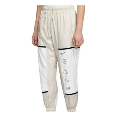 Nike (wmns)  Sportswear Woven Pants In Neutral
