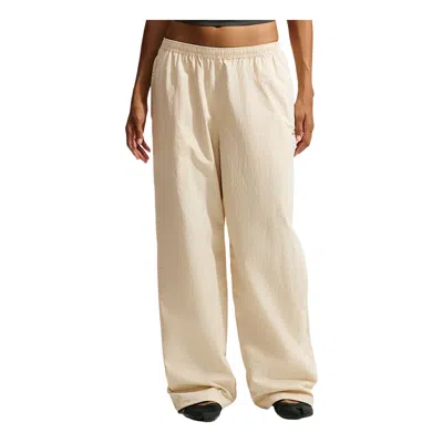 Nike (wmns)  X Skims Crunchy Nylon Wide-leg Pants 'parchment' In Neutral