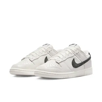 NIKE WOMEN'S DUNK LOW SE SNEAKERS IN WHITE/BLACK