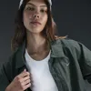Nike Women's  Sportswear Essential Oversized Uv Woven Coaches' Jacket In Green