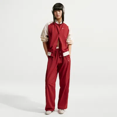 Nike Women's  Sportswear Loose High-waisted Parachute Pants In Red