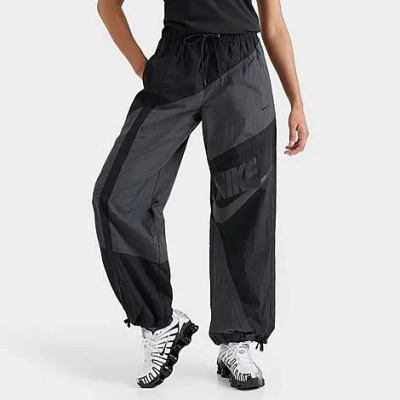 NIKE NIKE WOMEN'S SPORTSWEAR STREET MID-RISE LOOSE WOVEN OPEN-HEM PANTS