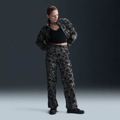 Nike Women's  Sportswear Windrunner Uv Protection Mid-rise Woven Printed Pants In Black