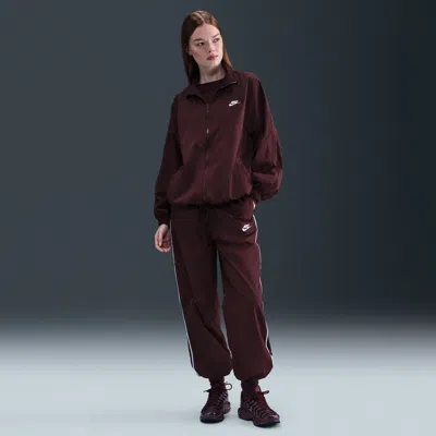 Nike Women's  Sportswear Windrunner Woven Pants In Burgundy