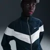 Nike Women's Windrunner Loose Uv Woven Full-zip Jacket In Blue