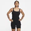 Nike Infinasoft Essentials Dri-fit Romper In Black/ Pcg6c