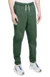 Nike Woven Tapered Leg Pants In Fir/white