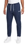 Nike Woven Tapered Leg Pants In Blue