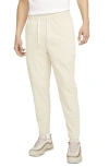 Nike Woven Tapered Leg Pants In Sanddrift/white