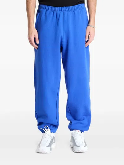 Nike X Acg Lungs Logo Fleece Track Pants In Blue