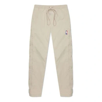 Nike X Fear Of God X Nba Crossover Side Solid Color Sports Pants Gray In Nude