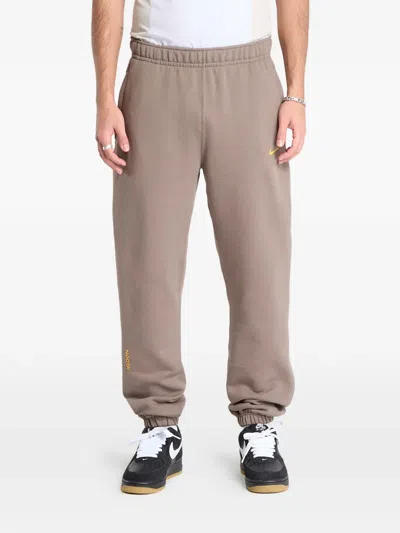 Nike X Nocta Logo-detail Track Pants In Gold