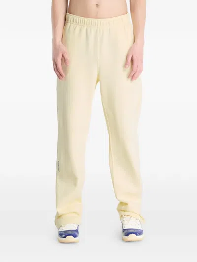 Nike X Nocta Open-hem Track Pants In Yellow