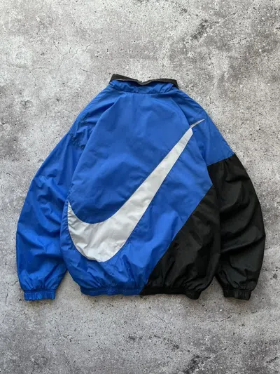 Nike big swoosh track jacket deals