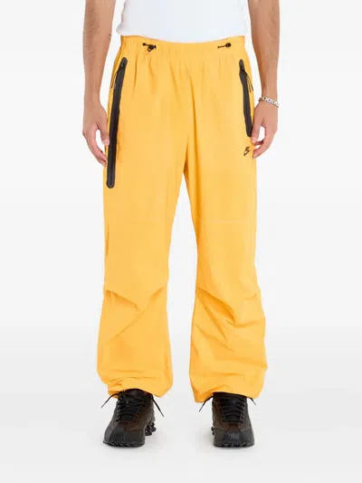 Nike Zip-pocket Woven Trousers In Yellow