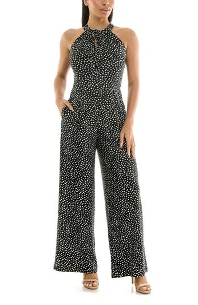 Nina Leonard Twisted Halter Neck Jumpsuit In Black/white Dots