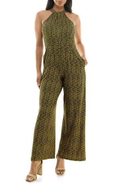 Shop Nina Leonard Twisted Halter Neck Jumpsuit In Black/yellow Multi