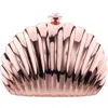 Nina Mariam Shell Clutch In Rosegold
