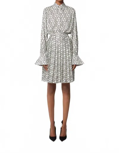 Nina Ricci All Over Logo Pleated Mini Skirt In Cream/noir In Multi