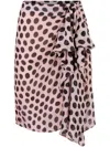 Nina Ricci Polka Dot Seersucker Skirt With Asymmetric Bow In Black On Blush In Pink