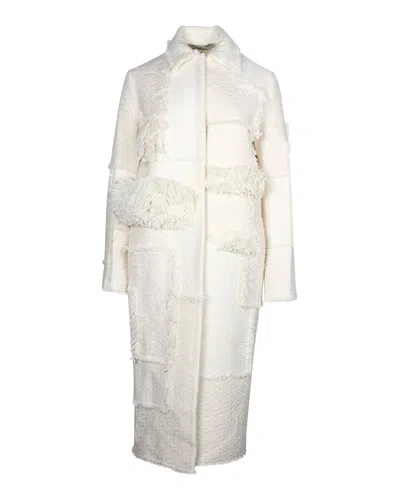 Nina Ricci Fringe Paneled Long Coat In Ecru Wool In White