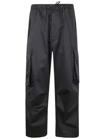 Nine In The Morning Alucien Cargo With Drawstring Man Trousers Clothing In Black