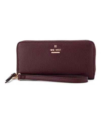 Nine West Luela Zip Around Wristlet In Purple