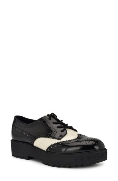 Nine West Resttin Wingtip Platform Derby In Black,cream Patent