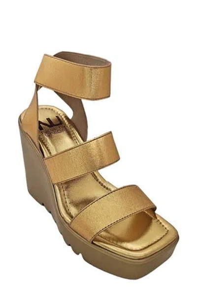 Ninety Union Paige Elastic Strap Wedge Sandal In Gold