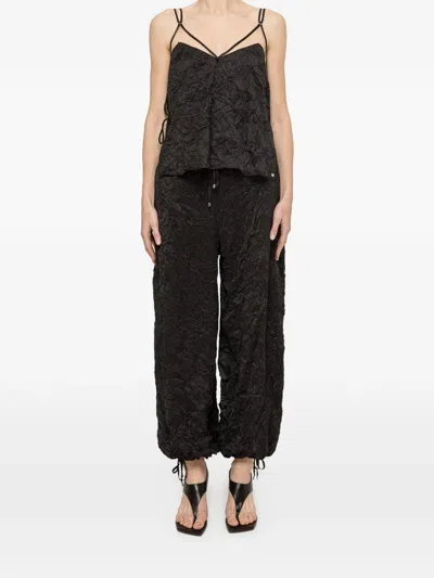 Nissa Crinkle-effect Trousers In Black