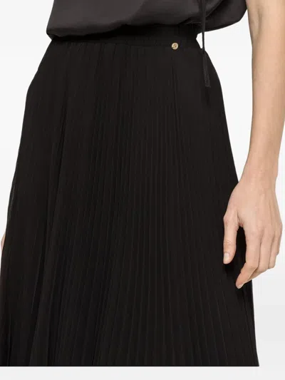 Nissa Pleated Midi Skirt In Black