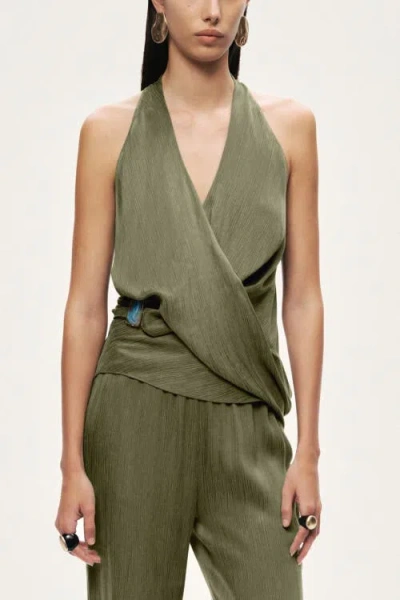 Nocturne Asymmetric Halter Wrap Top In Green