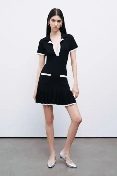 Nocturne Pleated Hem Knit Mini Dress In Black