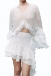 Nocturne Ruffle Asymmetric Mini Skirt In White