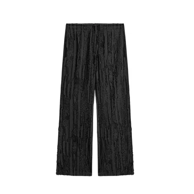 Nocturne Textured Relaxed-fit Pants In Black