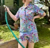 Nooworks Super Bloom Shortalls Romper In Print In Blue