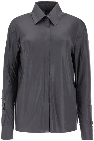Norma Kamali Fluid Jersey Lamã© Nk Blouse In Black