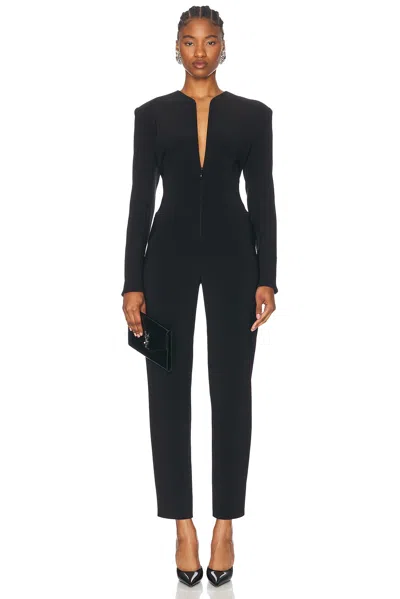 Norma Kamali Long Sleeve Shoulder Pad V Neck Zip Front Tapered Leg Jumpsuit In Black
