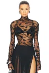 Norma Kamali Long Sleeve Turtleneck Top In Black Leaf