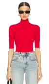 NORMA KAMALI SLIM FIT SHORT SLEEVE TURTLENECK TOP