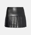 NORMA KAMALI PLEATED FAUX LEATHER MINISKIRT