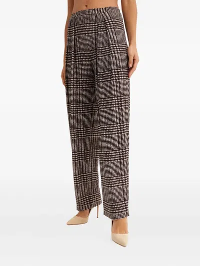 Norma Kamali Pleated Houndstooth Trousers In Brown