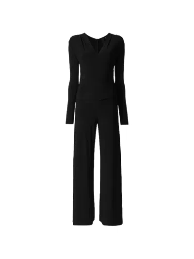 Norma Kamali V-neck Long Sleeve Shirred Waist Jumpsuit With Shoulder Pads In Black
